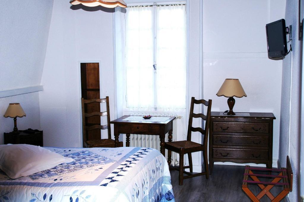 Le Fenelon Hotel Carennac Quarto foto
